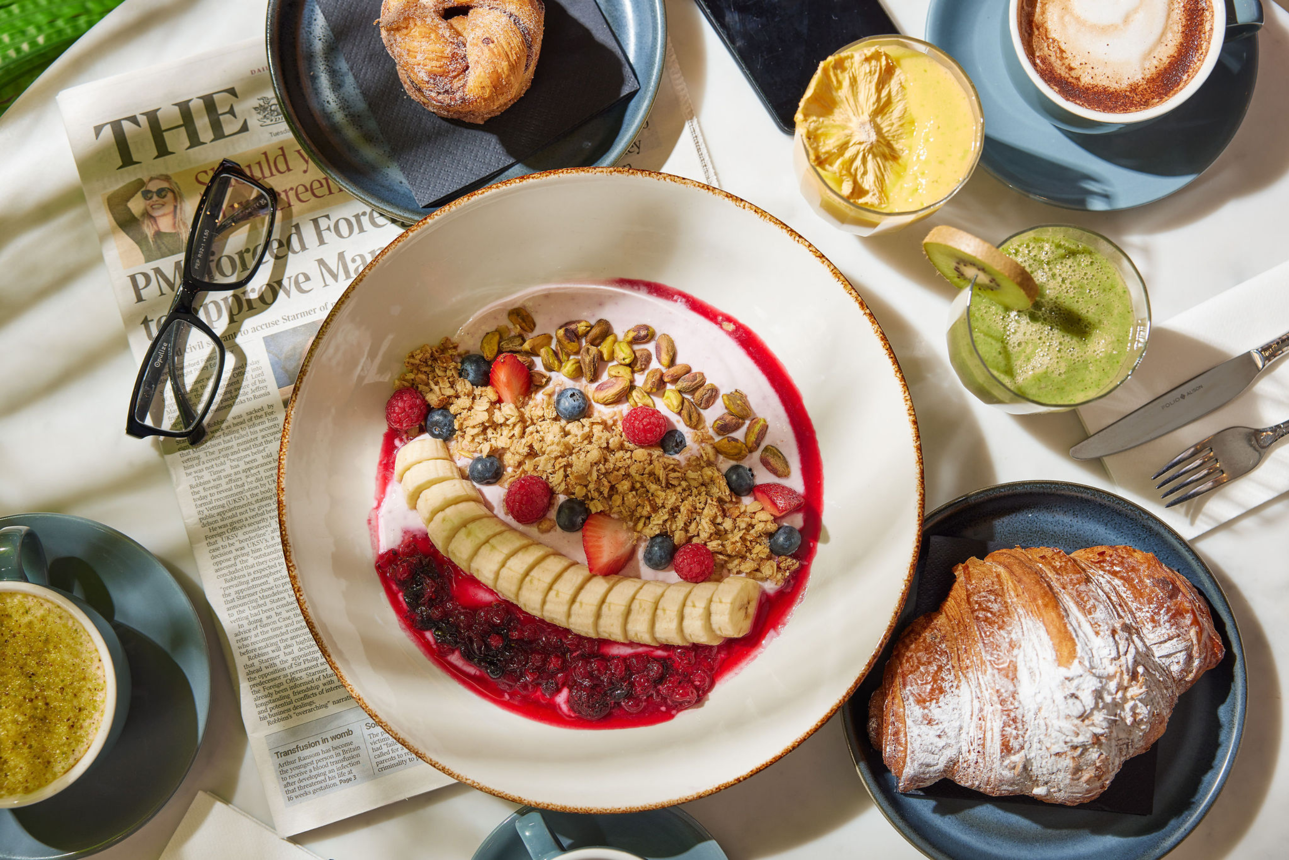 Breakfast plate at the SOAK with pastry, banana and muesli